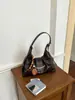 Bolsa de ombro retrô minimalista de grande capacidade transfronteiriça, bolsa de axila moderna e casual, nova bolsa transversal estilosa outono/inverno de 2026