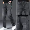Jeans Negros Puros de Alto Estiramiento para Otoño para Hombre Jóvenes Ajustados Rectos Sueltos Tallas Grandes Pantalones Casuales Gruesos