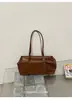 Bolso Boston de nicho coreano nuevo elegante moderno para ir al trabajo bolso de hombro único tipo almohada retro minimalista color liso bolso de axila