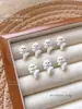 Pajarita Bichón Pequeño Manicura Joyería Cachorro de Dibujos Animados Lindo DIY Funda para Teléfono Móvil Accesorios de Diamantes para Uñas Portátiles Venta al por Mayor