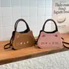 Bolso de hombro de gato nuevo y lindo de moda para mujer, bolso cruzado versátil retro casual personalizado de alta calidad elegante