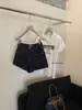 WGWE5344 Guangzhou Trece Líneas Ropa para Mujer Verano 2026 Nuevo Estilo Americano de Cintura Alta Rectos de Pierna Ancha Shorts de Mezclilla