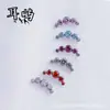 F136/G23 Aleación de Titanio Cinco Enlaces Circonio Joyería para Perforaciones Pendientes de Aleación de Titanio Clavos para Labios Clavos para Hueso de Oreja Venta al por Mayor