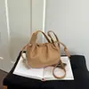 Bolso de cubo de mano muy elegante y único, nueva versión coreana otoño 2026, bolso de hombro y cruzado moderno y simple con forma de nube