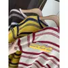 Suéter de rayas color block atmosférico y moderno, suéter de punto casual y estilizado para mujer, nueva colección Otoño/Invierno 26 H082812