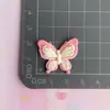 Accesorios de resina de mariposa de cinco colores pasador para el pelo funda de teléfono llavero adornos materiales de accesorios coloridos accesorios hechos a mano