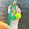 Llavero de cara sonriente colorida transfronteriza para coche de tenis, colgante de mochila moderno, regalo de llavero deportivo, venta al por mayor de comercio exterior