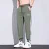 2025 Nova Primavera e Verão Calças Casuais de Seda Gelada Marca Tendência Masculina Esportivas Tendência Estilo Coreano Calças Versáteis Masculinas Respiráveis Masculinas
