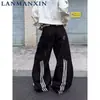 Jeans retro americano con patchwork de salpicaduras de pintura y tres rayas, dobladillo curvo, pantalones anchos holgados unisex, pantalones largos nuevos y elegantes