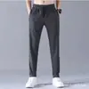 Calça Casual Masculina Popular de Verão Fina Transfronteiriça Respirável Solta Tamanho Grande Calça Masculina com Ar Condicionado Secagem Rápida Calça Esportiva Comércio Exterior