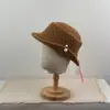Nuevo sombrero de pescador de punto calado vintage para mujer, elegante y que adelgaza la cara, con decoración de perlas, versátil y elegante