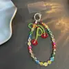 Cadena corta para teléfono móvil de flor con cuentas verdes hecha a mano, pulsera de cristal, cadena colgante para teléfono móvil
