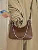 Yozzi 2026 nuevo modelo de principios de otoño, bolso de alta gama elegante moderno, bolso de hombro y axila versátil casual con cadena de moda