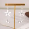Estilo Coreano Elegante Flor Pérola Gancho de Orelha Doce Moda Distintivo Brinco de Franja Leve Luxo Alto Padrão Versátil para Mulheres