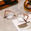 Gafas de Ojo de Gato Nuevas de Venta Caliente Transfronterizas con Patillas de Resorte, Monturas Ópticas Metálicas de Moda y Gama Alta Anti-Luz Azul