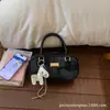 2026 Bolso de Mujer de Diseño de Nicho Transfronterizo Nuevo con un Toque de Lujo, Bolso de Mujer Rayado, Bolso Cruzado Versátil de Moda, Bolso Cuadrado Pequeño