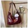 Bolsa de ombro grande para o dia a dia de mulheres, nova moda vintage 2025, bolsa tote versátil de nicho coreano