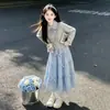Conjunto de Estilo Universitario para Niñas Otoño 2026 Nuevo Conjunto Coreano de Dos Piezas para Niñas Mayores: Sudadera y falda de dos piezas falsas