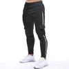 AliExpress eBay Comércio Exterior calça esportiva de pressão lateral masculina calça casual de moda multi-bolsos calça de tamanho grande K805