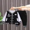Comercio exterior ropa infantil ropa de otoño europea y americana traje con capucha para niños suéter con capucha para niños combinación de colores conjunto de 3 piezas mono consignación 2