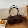 Bolsos de nicho franceses de alta calidad para mujer 2026 nuevo bolso retro de un solo hombro para debajo del brazo bolso de mano moderno de moda bolso baguette