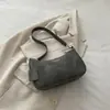 Bolso de mujer de alta gama, nuevo modelo otoño 2026, bolso de axila para el día a día, diseño de nicho moderno y simple, bolso de hombro pequeño