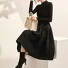 Outono e inverno de 2023 novo material texturizado malha outono e inverno manga longa pequeno vestido preto emagrecedor saia-calça de lã vestido