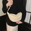 Bolso de diseñador de nicho para mujer, nuevo modelo 2026, bolso tipo empanada súper popular para llevar bajo el brazo, elegante y versátil bolso de hombro/cruzado con forma de cuerno