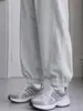 Pantalones de chándal grises de pierna ancha para mujer, pantalones harén de zanahoria holgados de otoño, estilo casual americano, pantalones deportivos rectos tipo plátano para figuras menudas