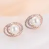 Brincos de botão com anel de metal e diamante em estoque transfronteiriços brincos de pérola elegantes e sexy brincos geométricos de nicho para mulheres