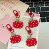 Nuevo para primavera y verano super hada lunares rojos manzana roja llavero colgante para mochila escolar ins regalo para novias pareja estuche para lápices joyería