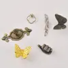 Una Variedad de Manijas Retro de Aleación de Zinc con Forma de Mariposa Manijas de un Solo Agujero de Estilo Europeo Moderno Simple para Gabinete Armario