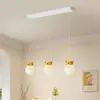 Lámpara de araña para restaurante, simple y moderna, estilo crema de moda, lámpara de mesa larga tipo barra, accesorios de iluminación artísticos de alta gama para comedor