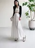 Falda blanca de estilo suave en línea A para mujer, nuevo modelo primavera/verano 2026, de cintura alta, adelgazante, con efecto de caída, falda larga de volantes
