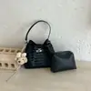 2026 Nova Moda Bolsa Saco com Textura Trançada Casual Chique Bolsa de Mão Simples Bolsa de Ombro Único Transversal Cor Sólida com Textura