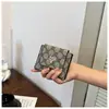 Portatarjetas para Mujer Estilo Coreano Moda Estampado de Letras Ultra-delgado Portadocumentos Organizador de Tarjetas de Crédito Bolso de Mano Simple y Ligero