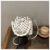 Bolso de mano de moda de lunares con cordón, estilo ins, para mujer, nuevo bolso cruzado versátil 2026, bolso tote pequeño súper popular