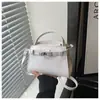 Bolso de Diseño de Nicho para Mujer 2026 Nuevo Otoño Simple de Hombro Cruzado Casual para Viaje Bolso Cuadrado Pequeño