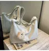 Bolso retro para mujer 2024 nuevo transfronterizo para estudiante universitario clase bandolera bolsa de mano de gran capacidad comercio exterior Al por mayor