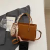 Bolso cruzado texturizado 2026 Nuevo bolso de moda para mujer Simple moderno versátil Bolso Kelly de bufanda Bolso de hombro de alta calidad