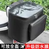 Cabe casco completoScooter eléctrico después de cubrir con películabolsa traseraalmacenamiento traseroasiento trasero de motocicletacolgandoen marcha negro