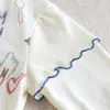 Camiseta de manga larga para niños, imitación de dos piezas, top de algodón puro con estampado de dibujos animados, camiseta básica para bebé de niña de primavera y otoño, moda de otoño