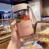 Taza de agua de vidrio de borosilicato de celebridad de internet portátil para hombres y mujeres con tapa taza transparente simple con funda para taza taza para llevar taza de té