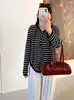 Blusa de Tricô Listrada com Capuz Versátil Plus Size Feminina para Outono 2026 para Mulheres Plus Size Simples Solta Casual