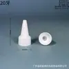 Estoque disponível fornecimento 18 dentes 20 dentes 24 dentes 28 dentes 32 dentes 42 dentes tampa bico pontiagudo branco Tampa de garrafa plástica universal