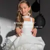 Vestido branco de princesa estilo novo para meninas, vestido de alça de verão infantil transfronteiriço europeu e americano, adequado para desfiles e eventos, com saia bufante floral