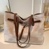 Bolso de mano retro a cuadros para mujer, nuevo estilo coreano moda primavera/verano 2026 bolso cubo de hombro y bandolera para verano