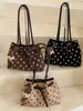 Bolso de mano simple de lunares estilo coreano Shuai Mi Jia para mujer, nuevo bolso tote moderno y elegante de nicho para el día a día 2026