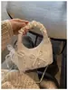 Bolso plisado de diseño único y de nicho para mujer, nuevo estilo 2026, bolso cruzado versátil, bolso tote pequeño súper popular, bolso croissant