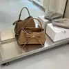 Bolso retro tipo coreano para debajo del brazo para mujer, nueva colección otoño/invierno 2026, lujo ligero, diseño de nicho, sensación de alta gama, bolso de hombro, bolso cruzado